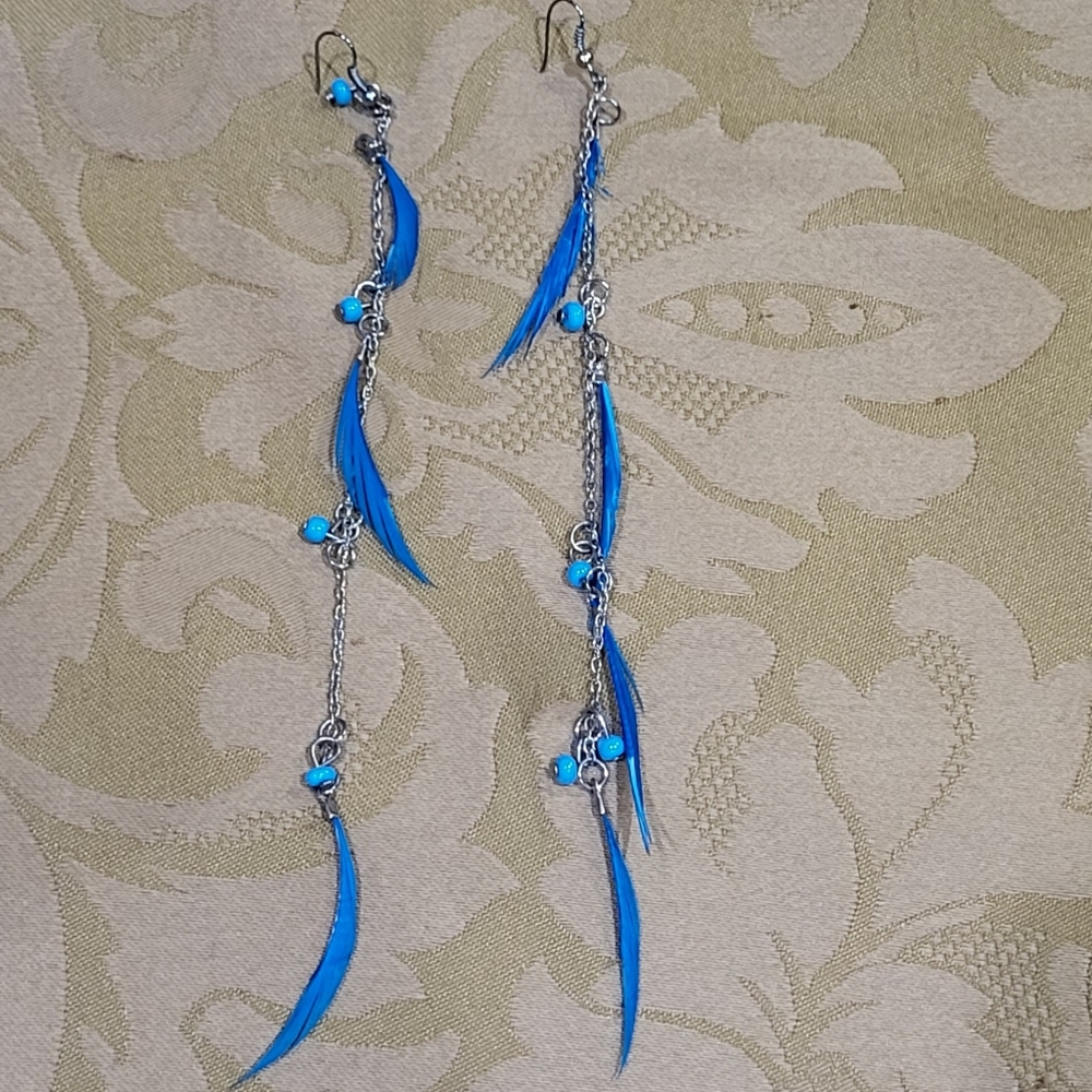 Long skinny blue feather and bead hook earrings